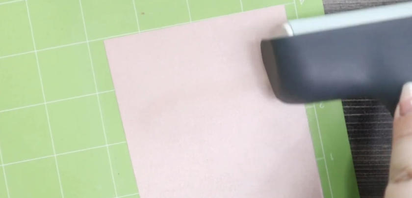 Brayer over cardstock on cricut mat